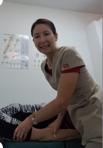Dr. Meiri adjusts patients
