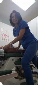 Dr. Natalie Meiri adjusts the shoulder joint
