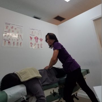 Dr. Meiri adjusts the spine